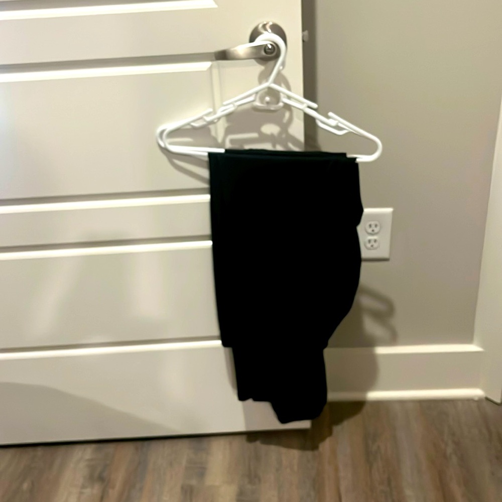 2 pairs of identical black leggings